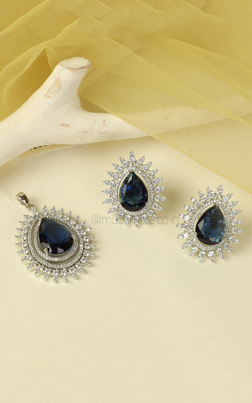 Tear Drop Shaped Sapphire Blue Silver Polish Pendant In AD