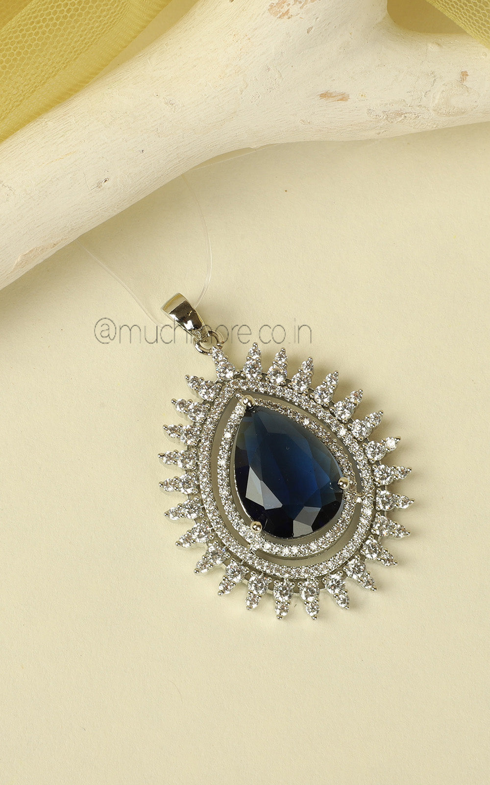 Tear Drop Shaped Sapphire Blue Silver Polish Pendant In AD