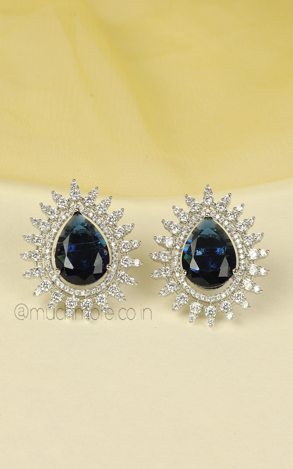 Tear Drop Shaped Sapphire Blue Silver Polish Pendant In AD