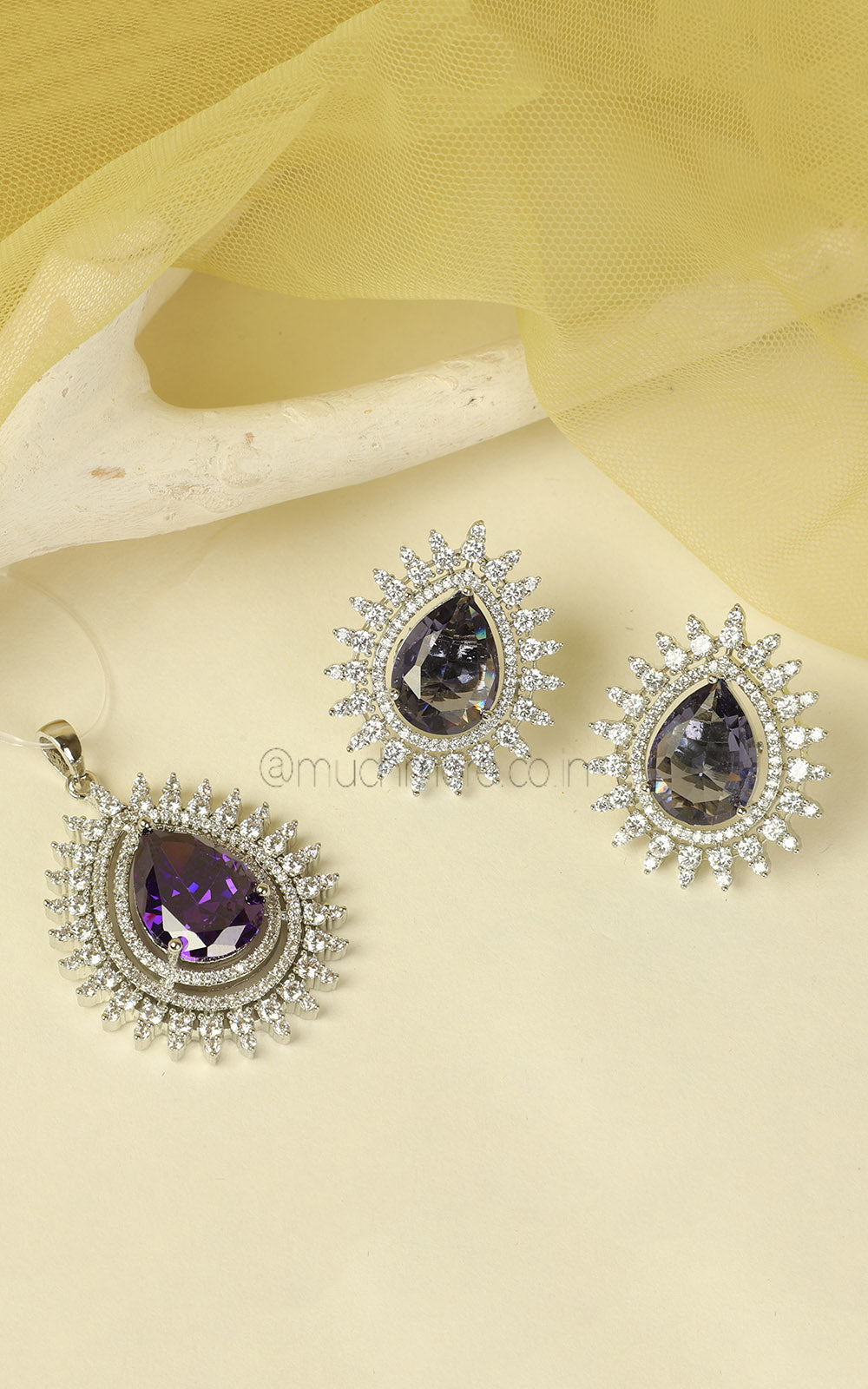 Tear Drop Shaped Amethyst Silver Polish Pendant In AD