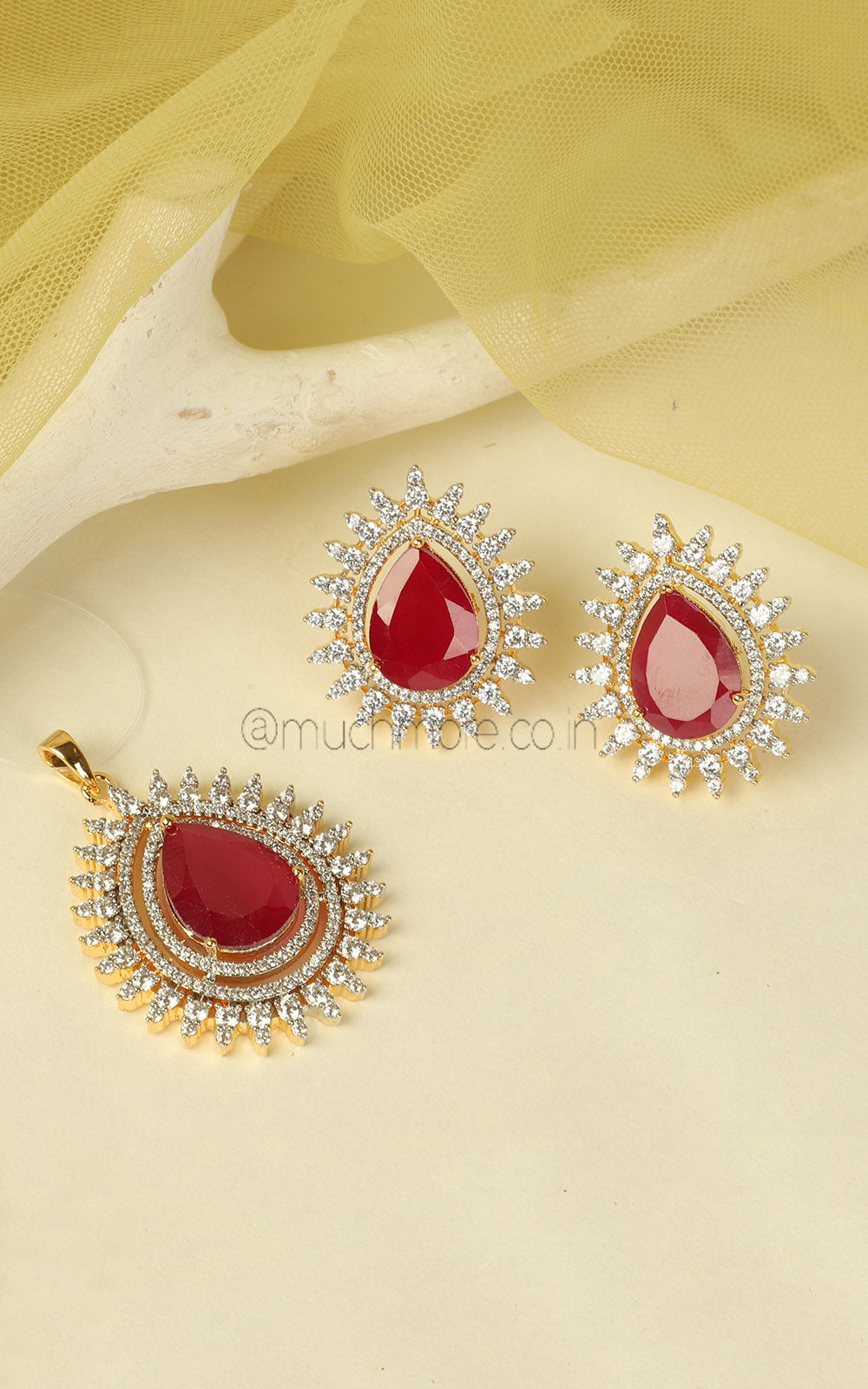 Tear Drop Shaped Sapphire Ruby Gold Polish Pendant In AD