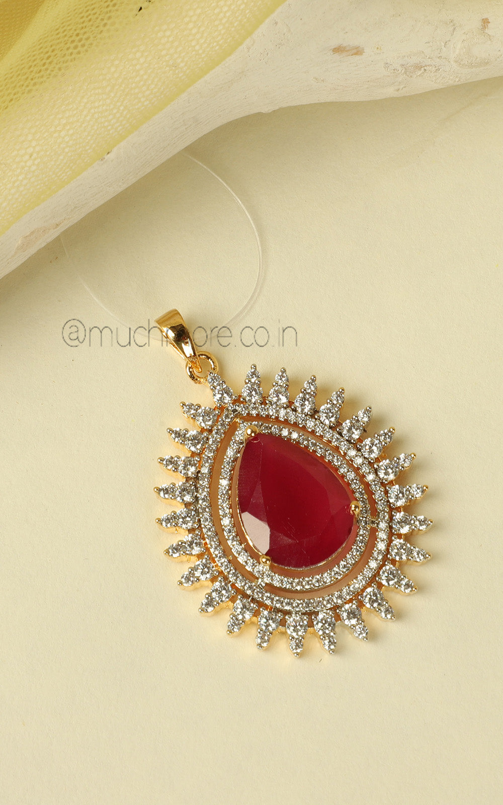 Tear Drop Shaped Sapphire Ruby Gold Polish Pendant In AD