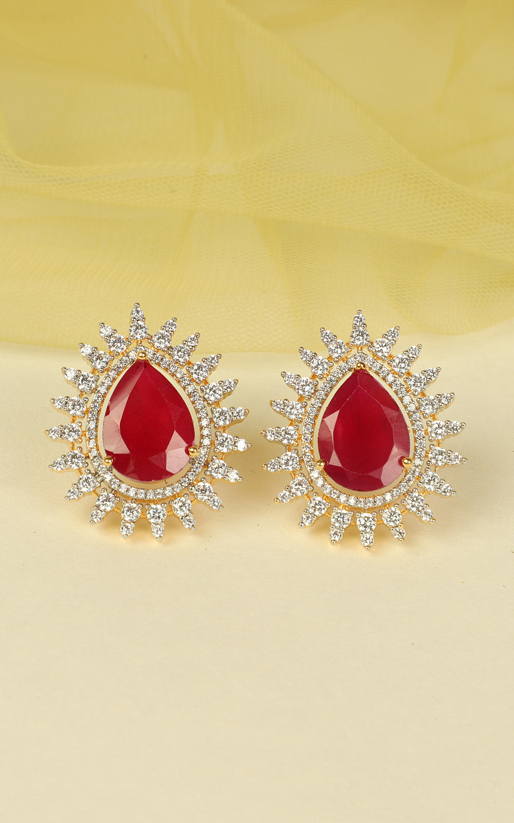 Tear Drop Shaped Sapphire Ruby Gold Polish Pendant In AD