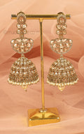 Champagne Long Jhumka Earrings In Antique Gold Polish Online