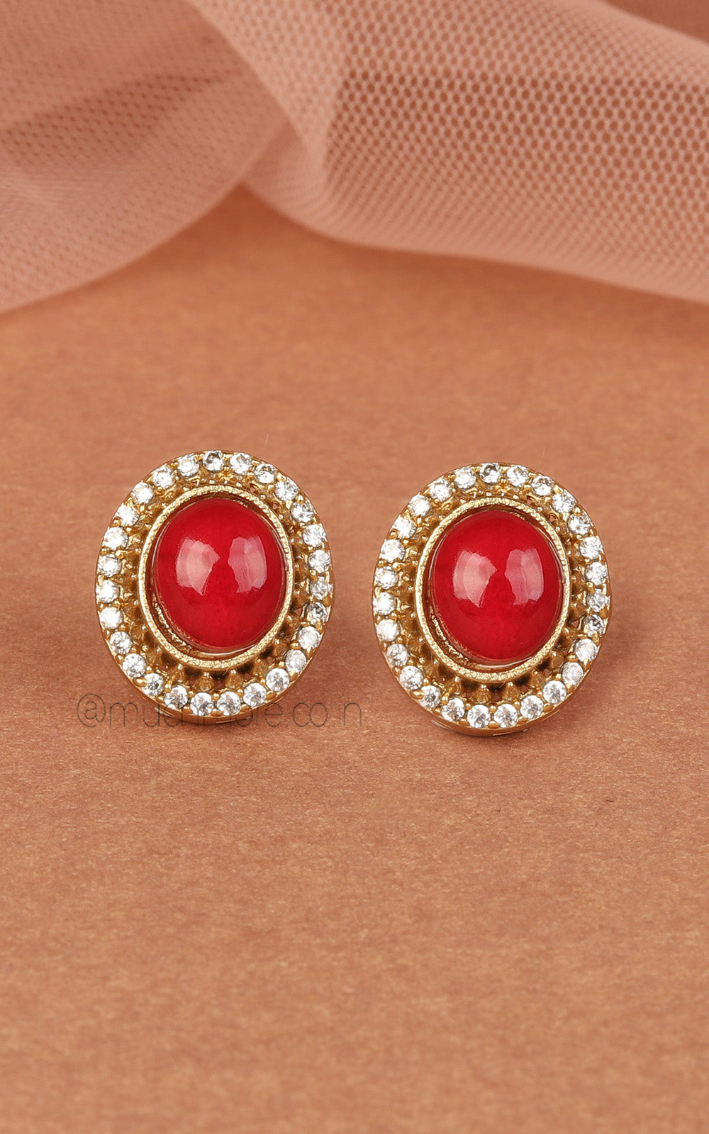 Ruby Oval Shaped Cute Stud Earrings In Gold Polish