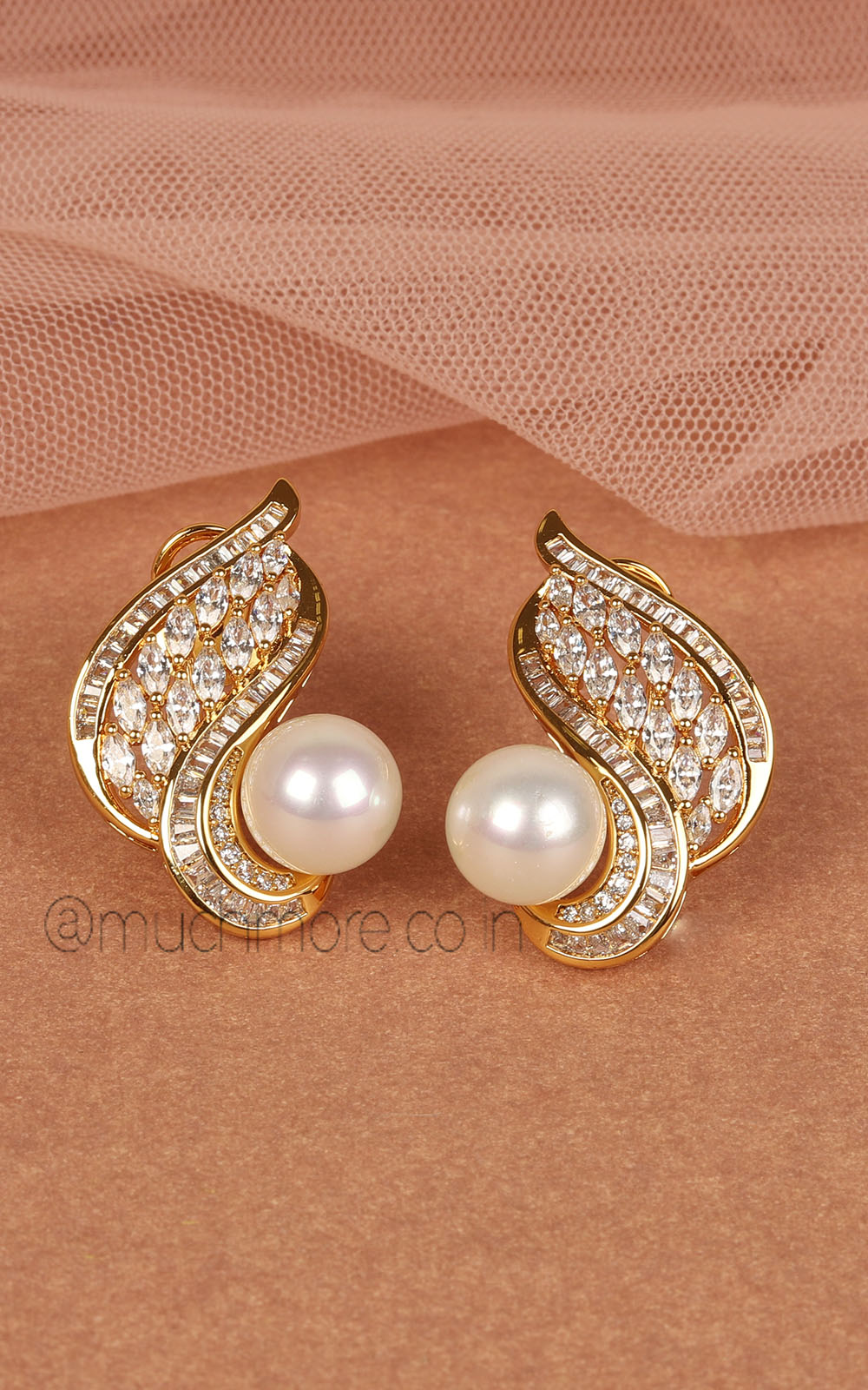 Designer Gold Polish Pearl And Diamond Stud Earrings