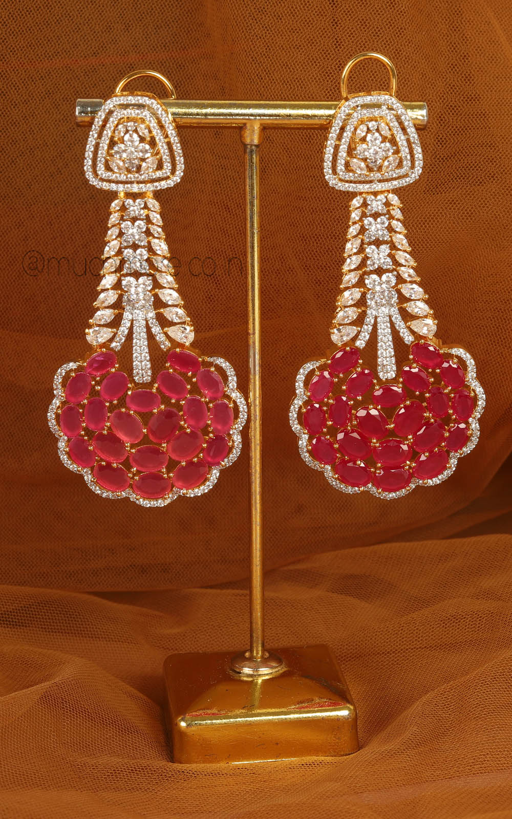 Beautifully Crafted Gold Polish Ruby AD And Zircon Earrings