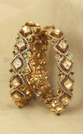 Polki With Diamonds In Emerald Green Kundan Bangles