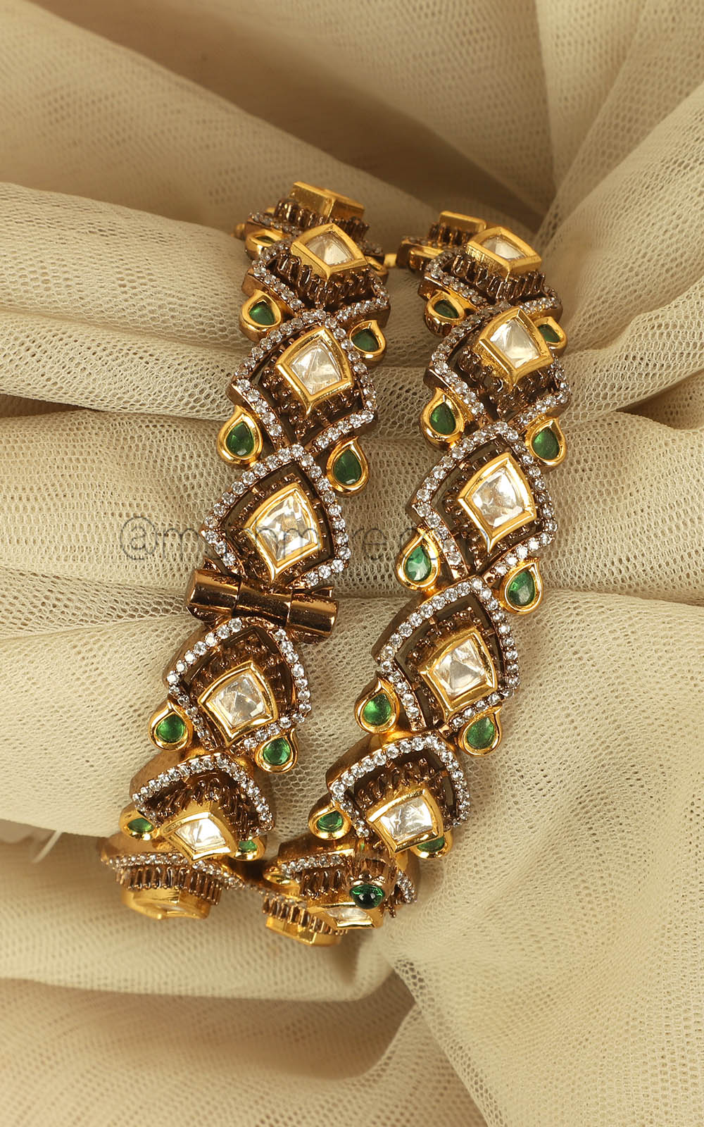 Polki With Diamonds In Emerald Green Kundan Bangles