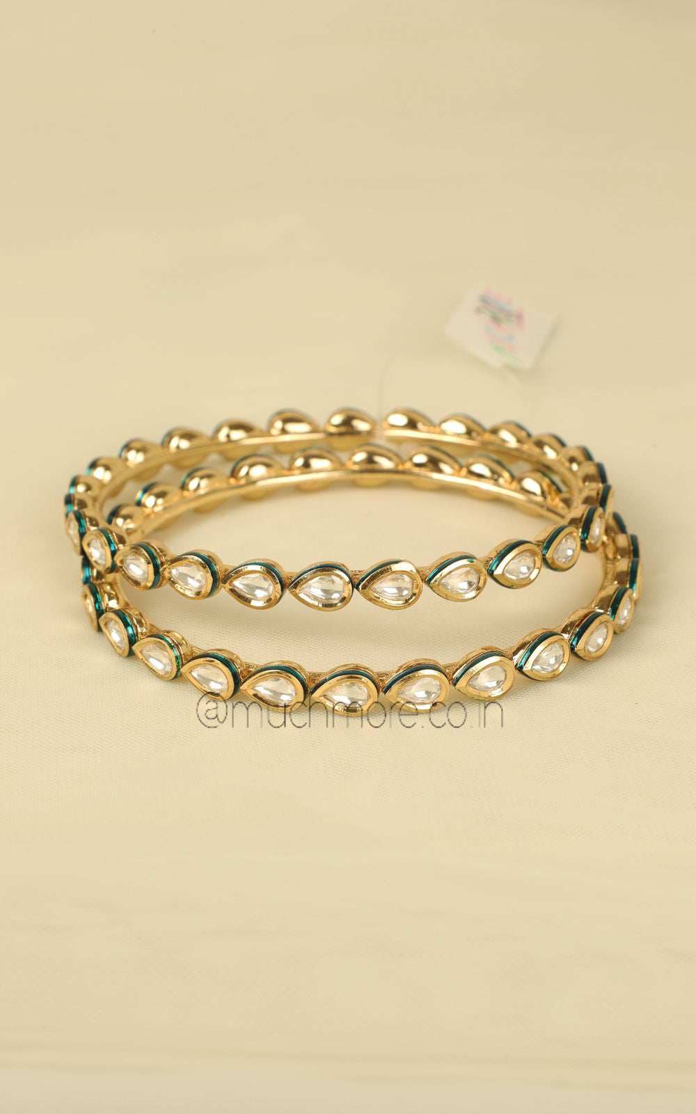 Drop Shaped Kundan Bangles with Gold Polish for Daily Wear