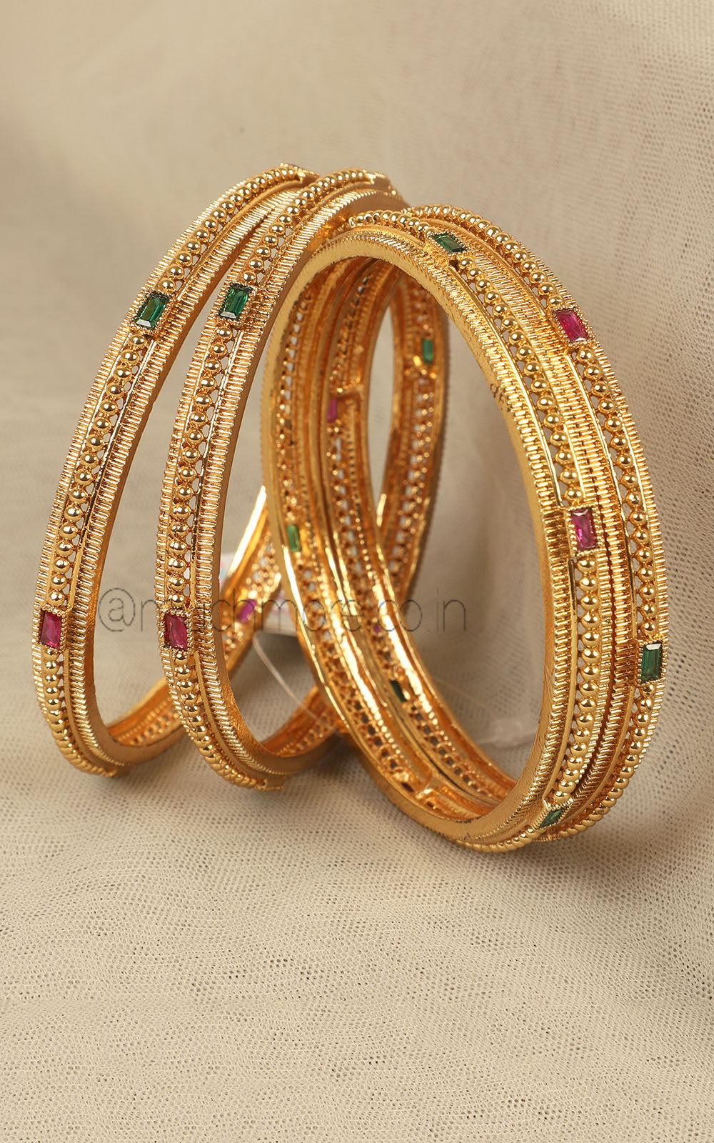 Set Of 4 Sleek Gold Look Bangles For Women