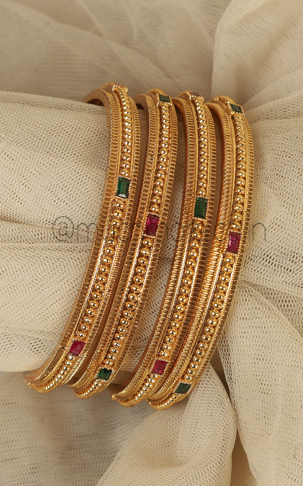 Set Of 4 Sleek Gold Look Bangles For Women