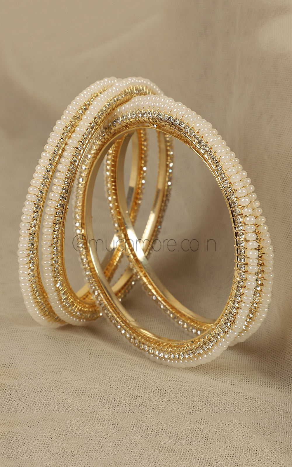 Set Of 4 Sleek Pearl Bangles In Gold Polish