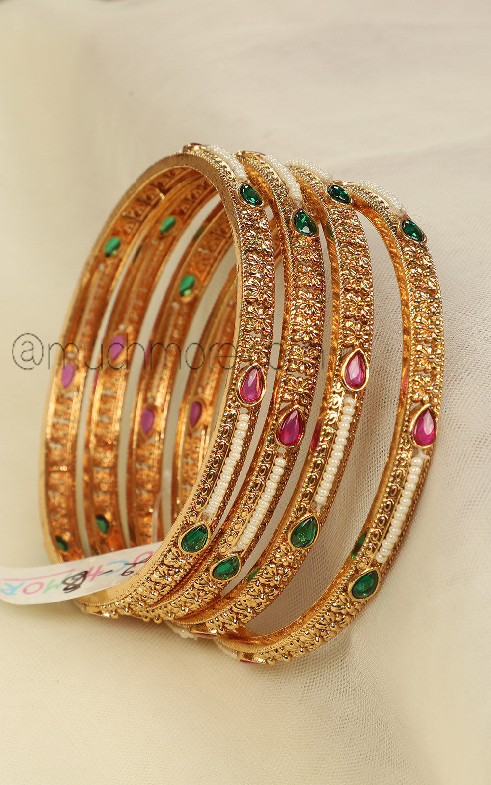 Sleek Gold Look Ruby Green Bangles Set Of 4