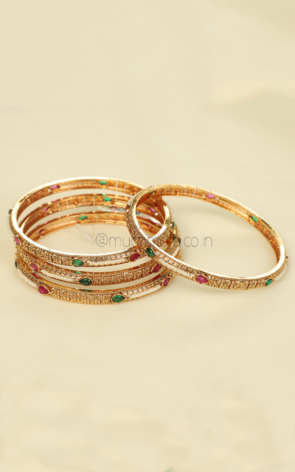 Sleek Gold Look Ruby Green Bangles Set Of 4