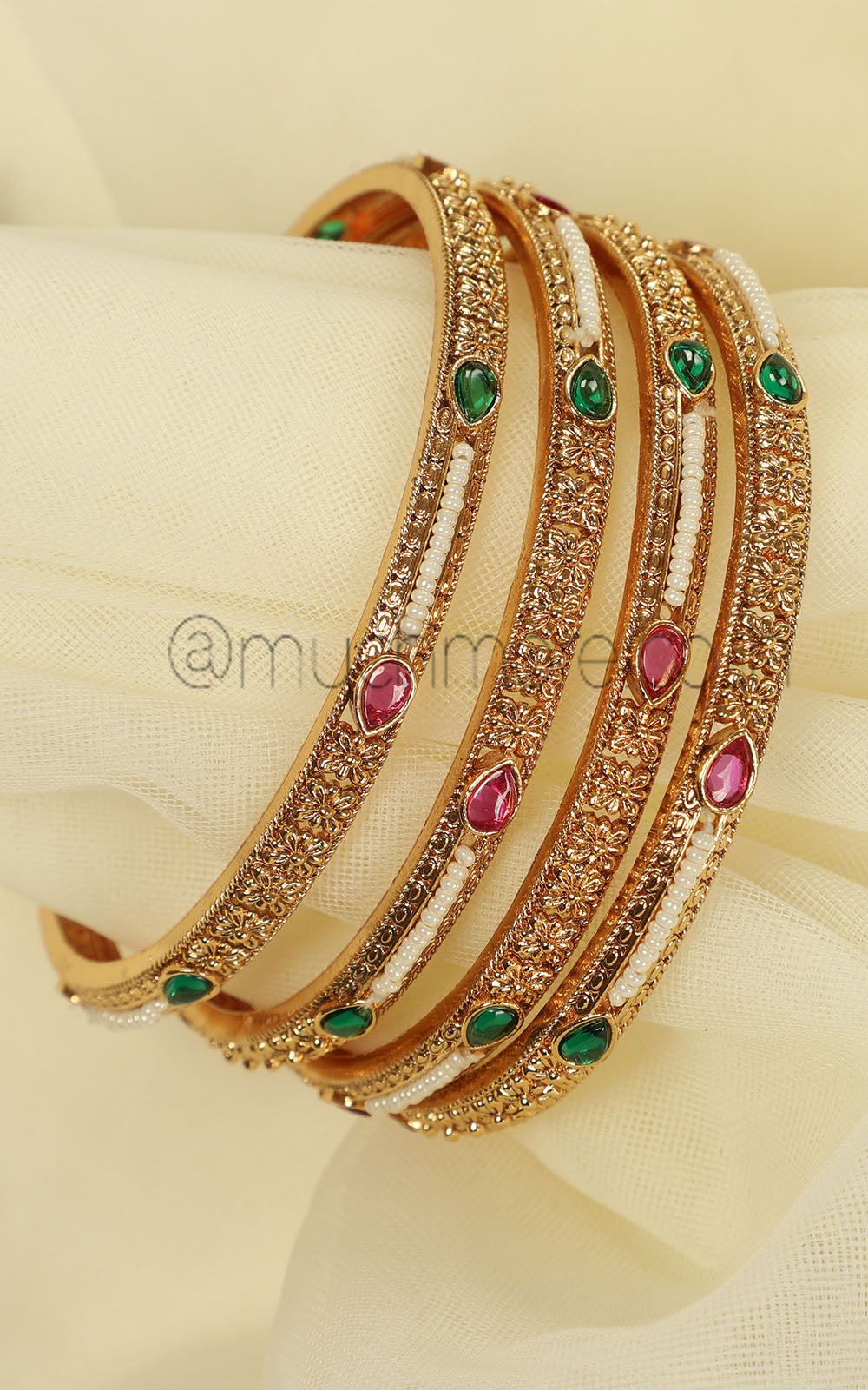 Sleek Gold Look Ruby Green Bangles Set Of 4