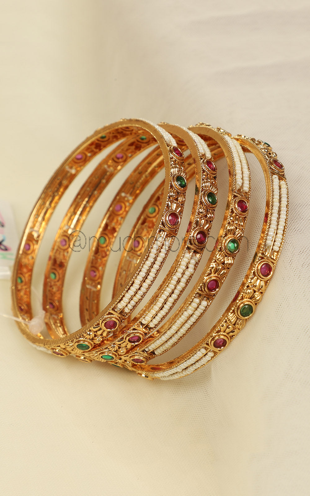 Sleek Gold Look Ruby Green With Pearls Bangles Set Of 4