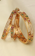 Sleek Gold Look Ruby Green With Pearls Bangles Set Of 4