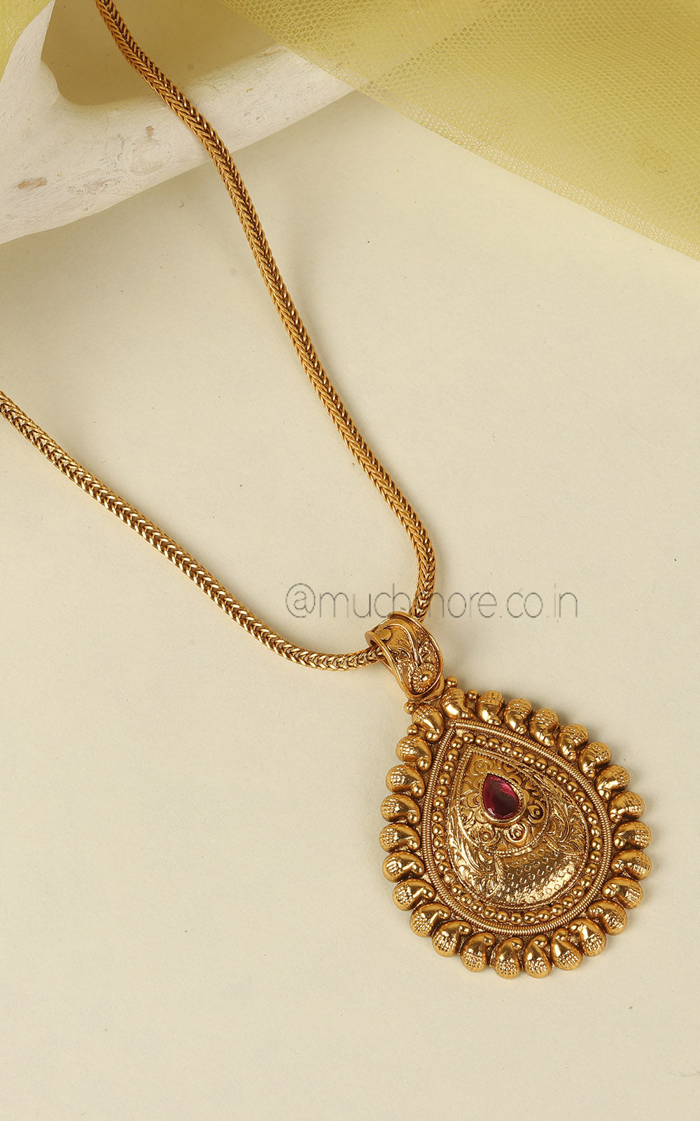 Drop Shaped Ruby Color Gold Look Pendant With Earrings
