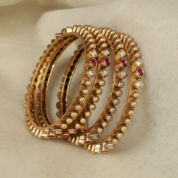 Gold Plated Ruby Set Of 4 Bangles By Much More 
